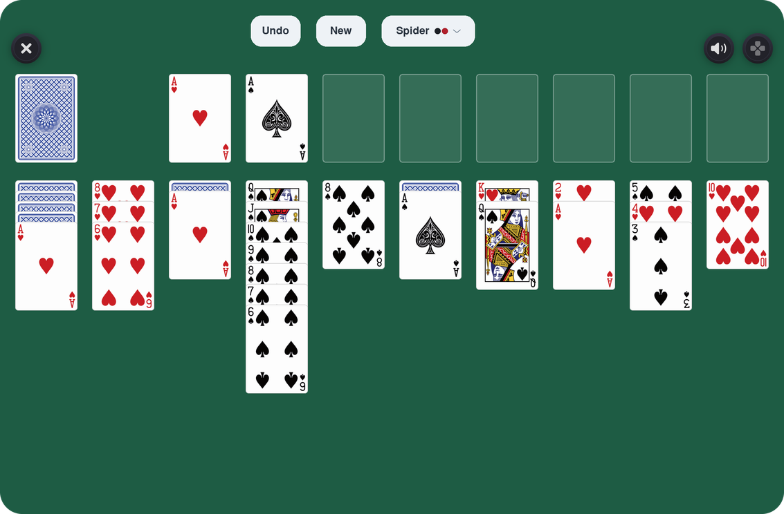 Solitaire running in Juno, showing a Spider deal on a green table with Undo, New and Spider controls